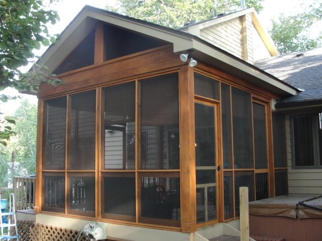 Screened porch addition in Minnesota, installed by Titus Contracting design and build team.