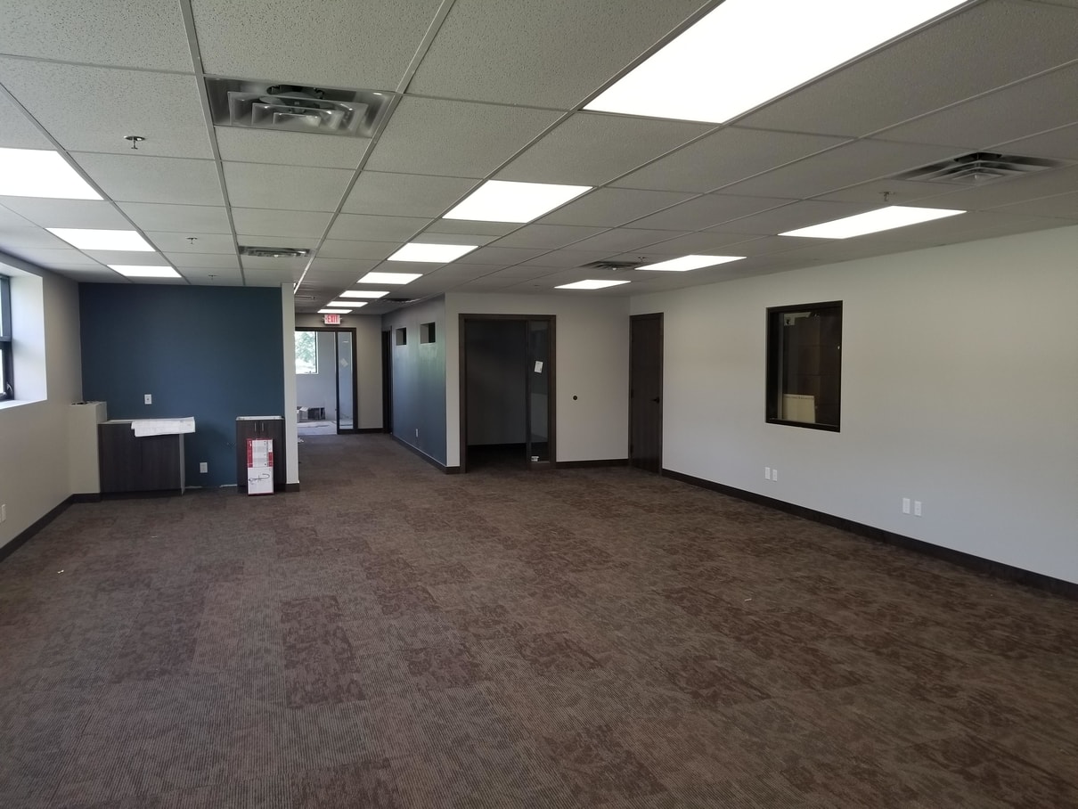 Office remodeling and design project in Forest Lake, MN completed by Titus Contracting.