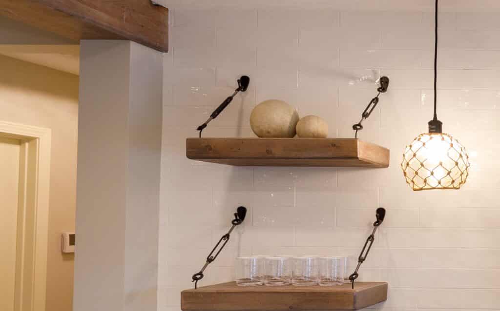 Raw Wood Floating Shelves in Lower Level Bar