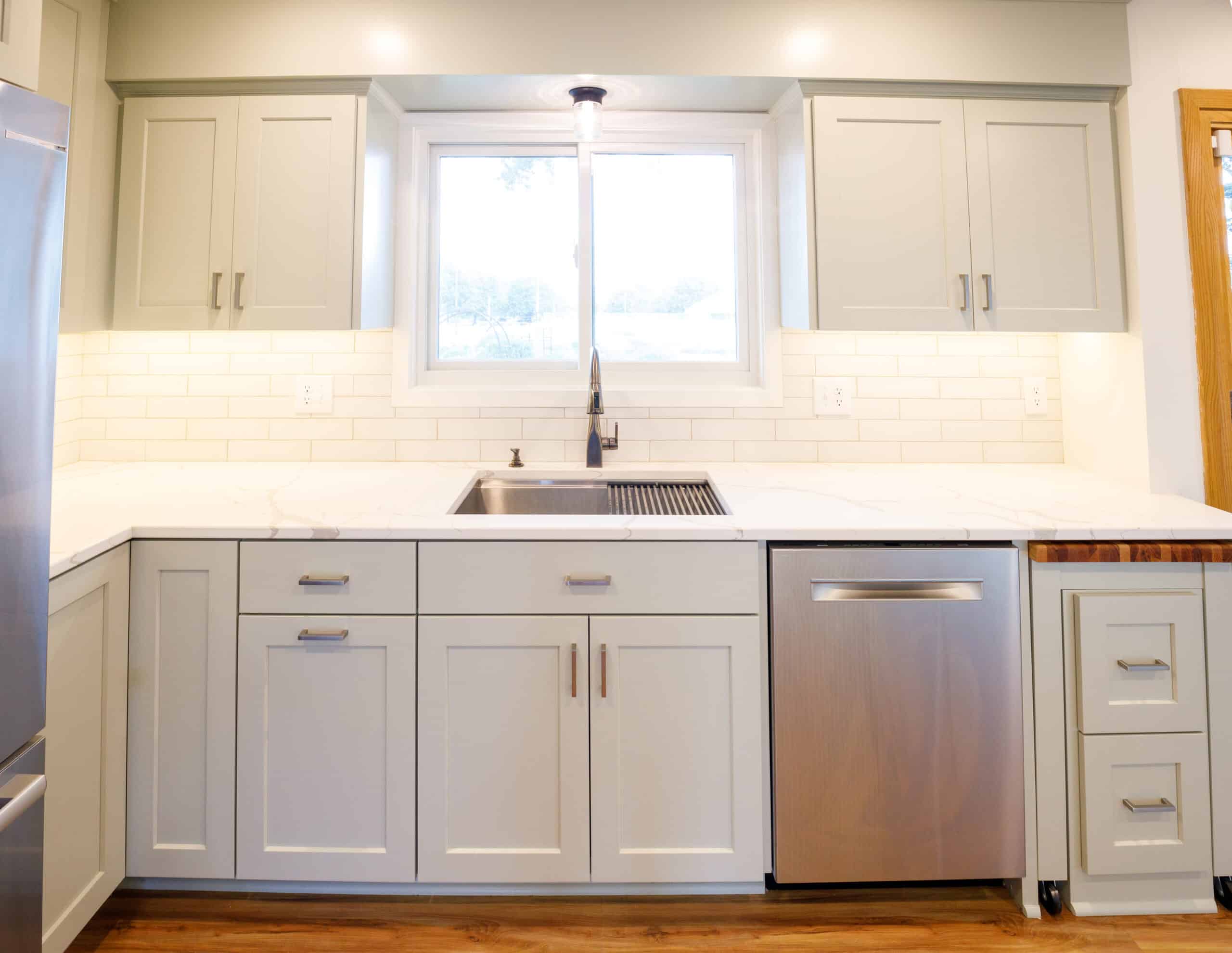 Kitchen sink and wall cabinets