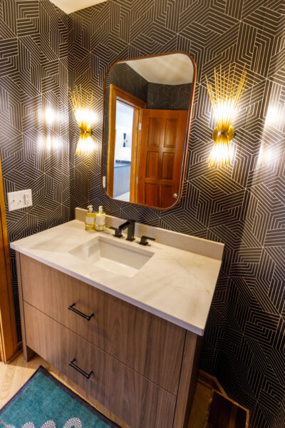 bathroom with funky geometric wallpaper
